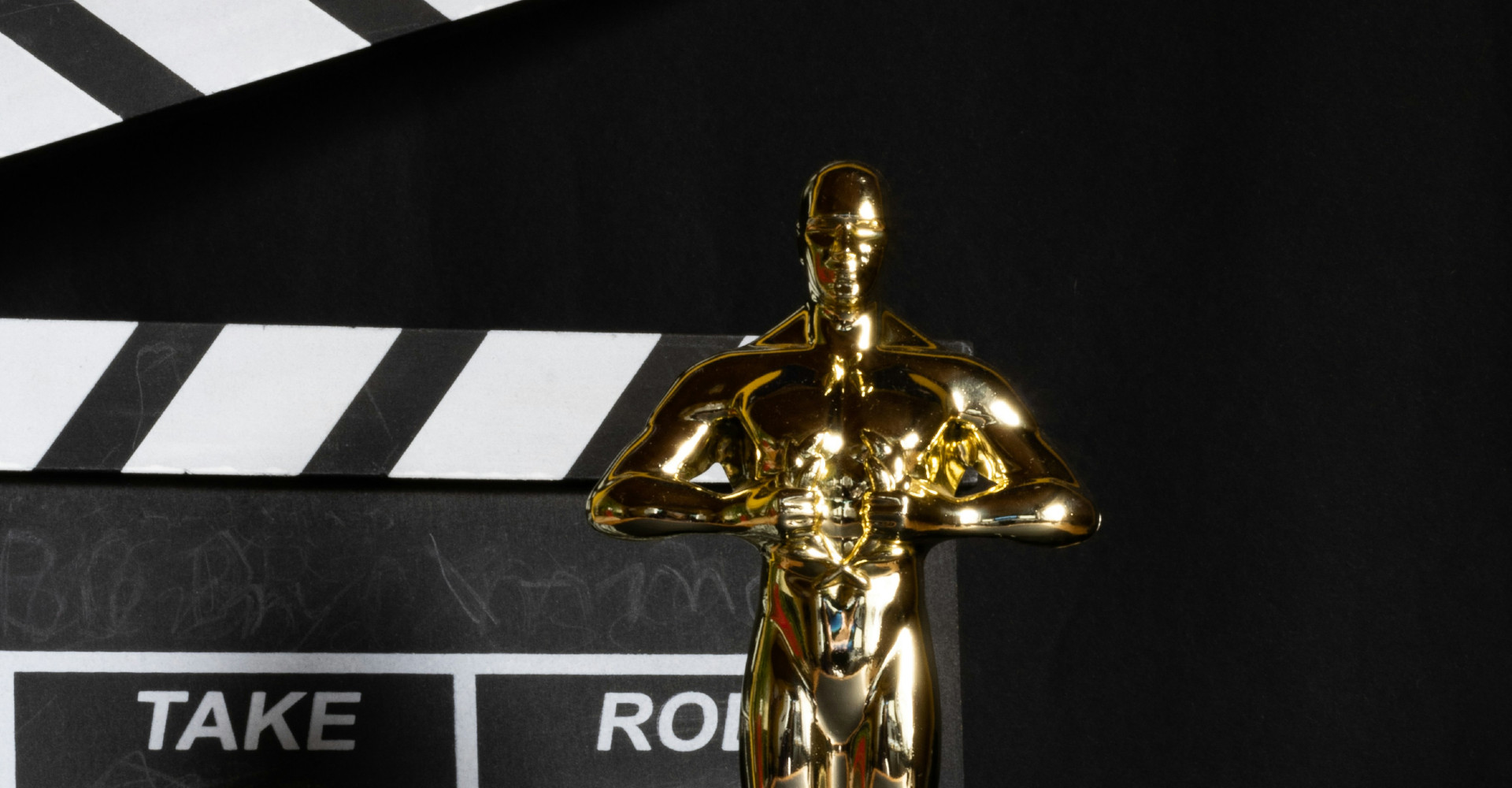 golden award in front of clapper board