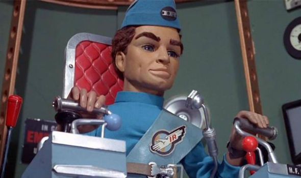 Puppet dressed in smart pilot's clothing looking serious